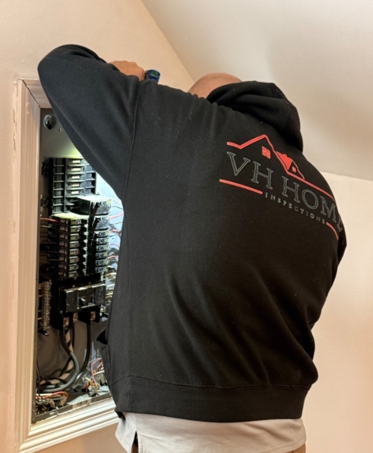 Mike inspecting an electrical panel